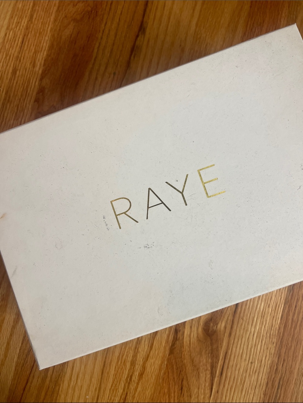 RAYE White Box with Gold Logo